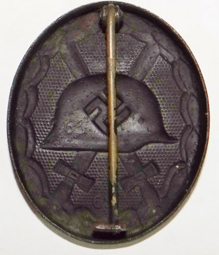 "65" Maker Marked WW II Black Wound Badge